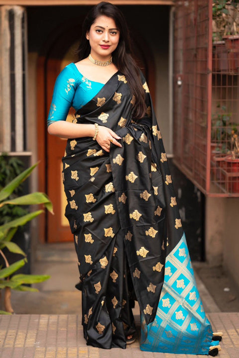 VastraLakshmi Elaborate Black and Firozi Soft Silk Saree With Piquant Blouse Piece