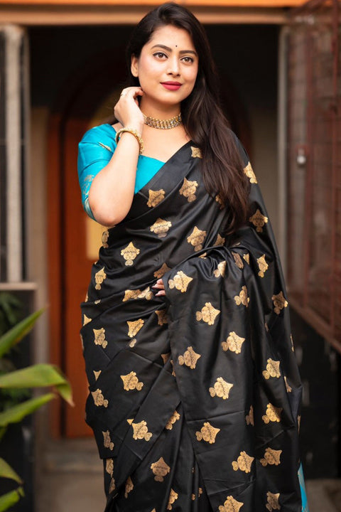 VastraLakshmi Elaborate Black and Firozi Soft Silk Saree With Piquant Blouse Piece