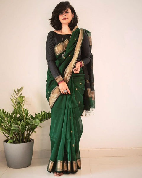 VastraLakshmi Snazzy Dark Green Linen Silk Saree With Glittering Blouse Piece