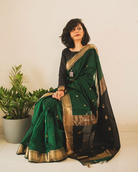 VastraLakshmi Snazzy Dark Green Linen Silk Saree With Glittering Blouse Piece