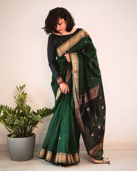 VastraLakshmi Snazzy Dark Green Linen Silk Saree With Glittering Blouse Piece