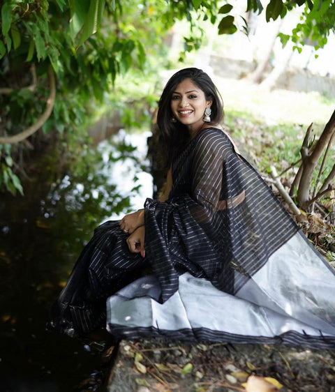 VastraLakshmi Intricate Black Soft Silk Saree With Whimsical Blouse Piece