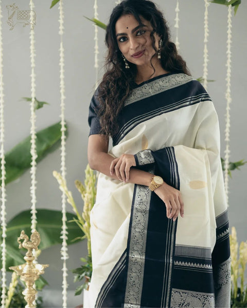 VastraLakshmi Adorable Off White Soft Silk Saree With Flameboyant Blouse Piece