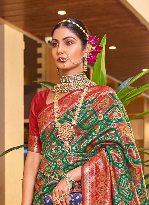 VastraLakshmi Classy Dark Green Patola Silk Saree with Extraordinary Blouse Piece