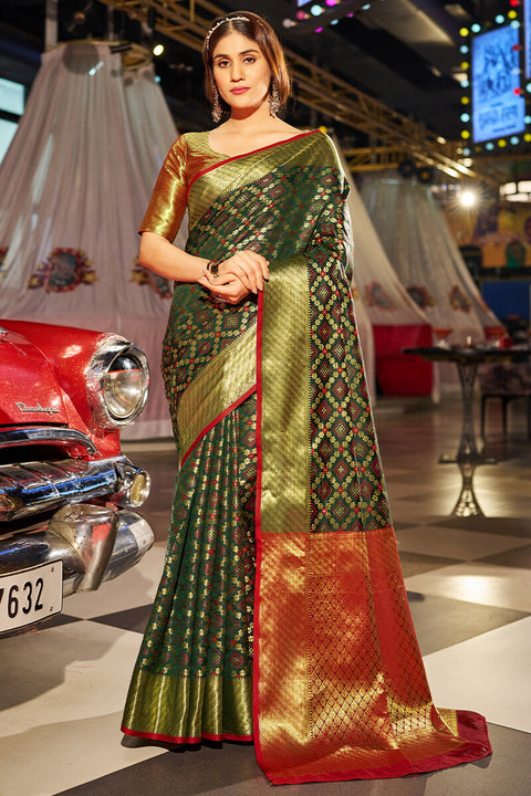 VastraLakshmi Beauteous Dark Green Patola Silk Saree with Pleasant Blouse Piece