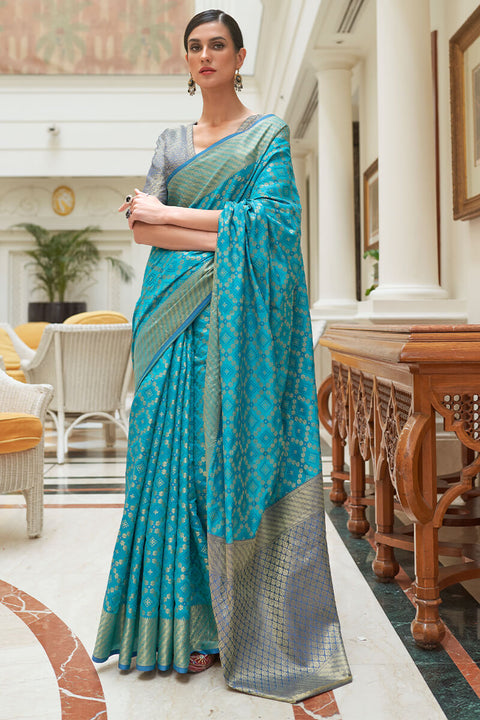 VastraLakshmi Sumptuous Firozi Soft Patola Silk Saree with Palimpsest Blouse Piece