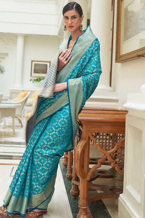 VastraLakshmi Sumptuous Firozi Soft Patola Silk Saree with Palimpsest Blouse Piece