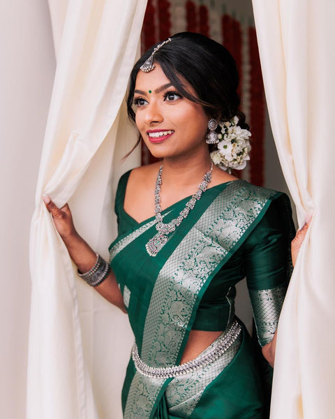 VastraLakshmi Gleaming Dark Green Soft Banarasi Silk Saree With Beautiful Blouse Piece