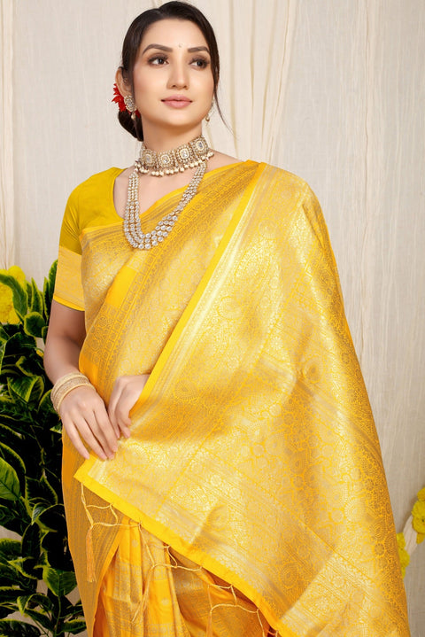 VastraLakshmi Eye-catching Yellow Kanjivaram Silk Saree With Glittering Blouse Piece