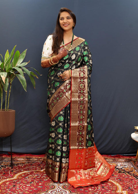 VastraLakshmi Magnificat Dark Green Patola Silk Saree with Ineffable Blouse Piece