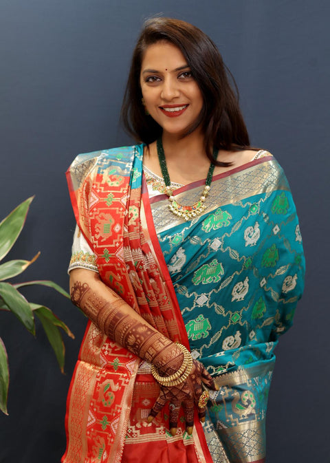 VastraLakshmi Effervescent Rama Patola Silk Saree with Piquant Blouse Piece