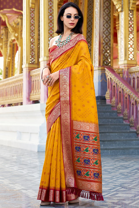 VastraLakshmi Unequalled Yellow Patola Silk Saree with Enthralling Blouse Piece