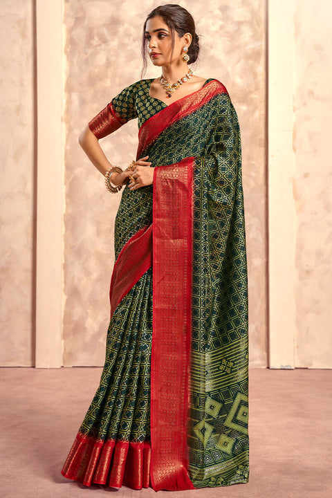 VastraLakshmi Enigmatic Dark Green Foil Printed Dola Silk Saree With Incomparable Blouse Piece