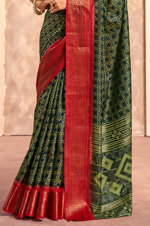 VastraLakshmi Enigmatic Dark Green Foil Printed Dola Silk Saree With Incomparable Blouse Piece