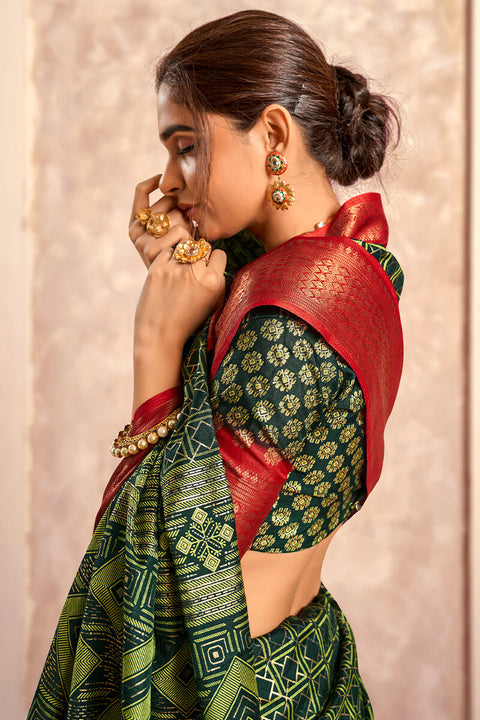 VastraLakshmi Enigmatic Dark Green Foil Printed Dola Silk Saree With Incomparable Blouse Piece