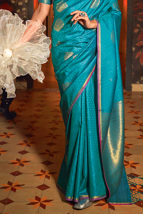 VastraLakshmi Panoply Firozi Soft Banarasi Silk Saree With Seraglio Blouse Piece