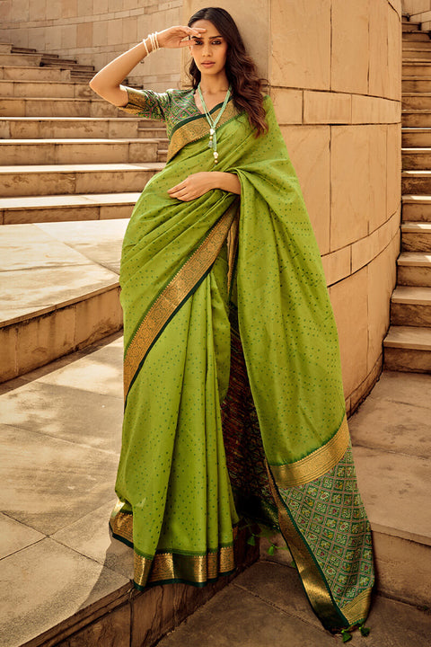 VastraLakshmi Ornate Green Patola Silk Saree with Tremendous Blouse Piece