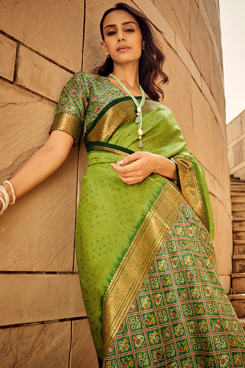 VastraLakshmi Ornate Green Patola Silk Saree with Tremendous Blouse Piece