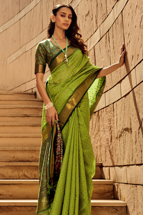 VastraLakshmi Ornate Green Patola Silk Saree with Tremendous Blouse Piece