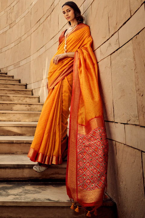 VastraLakshmi Staggering Orange Patola Silk Saree with Redolent Blouse Piece