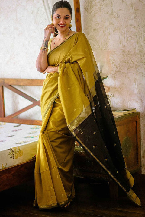 VastraLakshmi Gleaming Mustard Cotton Silk Saree With Classy Blouse Piece