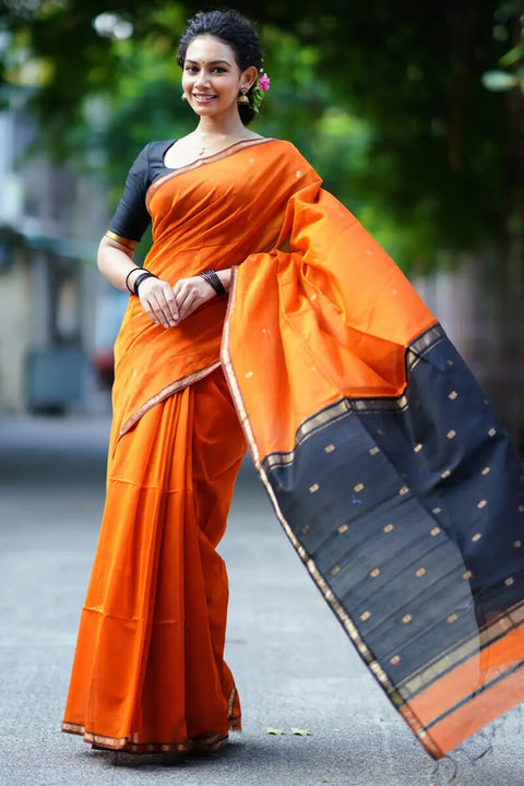 VastraLakshmi Enigmatic Orange Cotton Silk Saree With Panache Blouse Piece