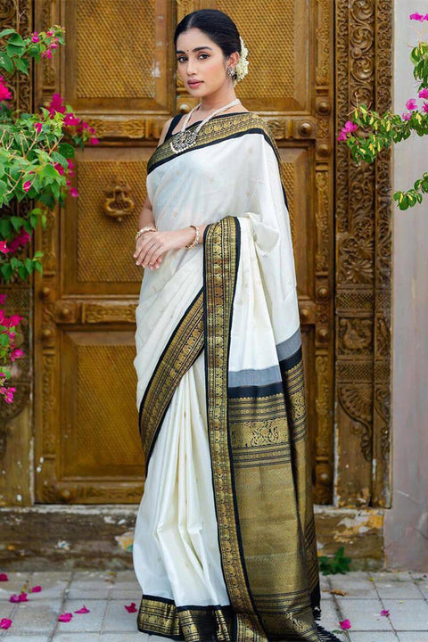 VastraLakshmi Surpassing Off White Soft Silk Saree With Flameboyant Blouse Piece