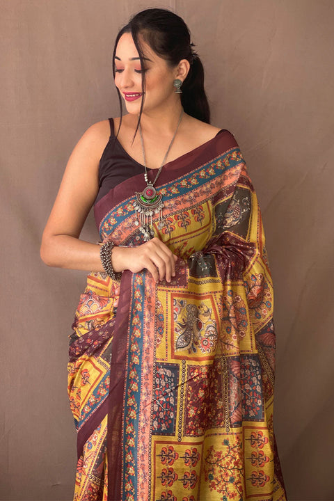 VastraLakshmi Effulgent Mustard Kalamkari Printed Saree With Ornate Blouse Piece