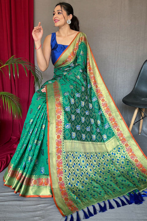 VastraLakshmi Delectable Green Patola Silk Saree with Propinquity Blouse Piece