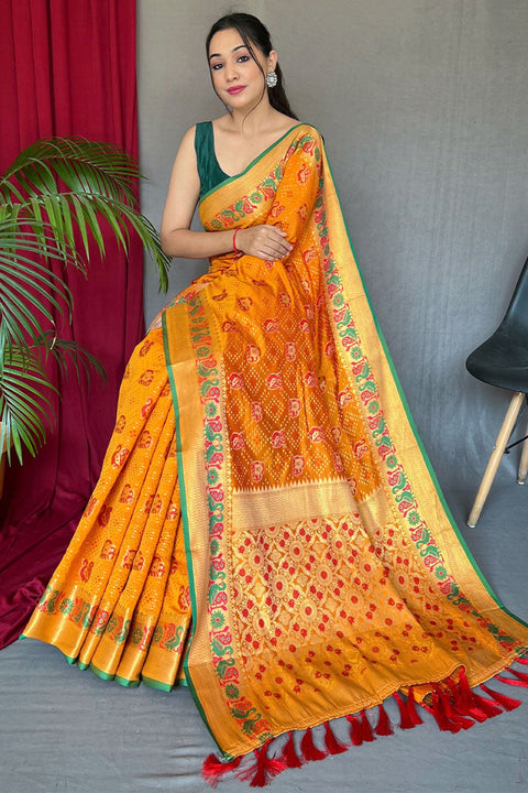 VastraLakshmi Fugacious Yellow Patola Silk Saree with Serendipity Blouse Piece