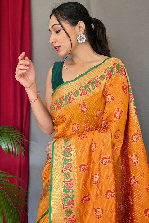 VastraLakshmi Fugacious Yellow Patola Silk Saree with Serendipity Blouse Piece