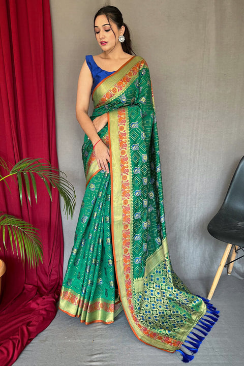 VastraLakshmi Mesmeric Green Patola Silk Saree with Twirling Blouse Piece