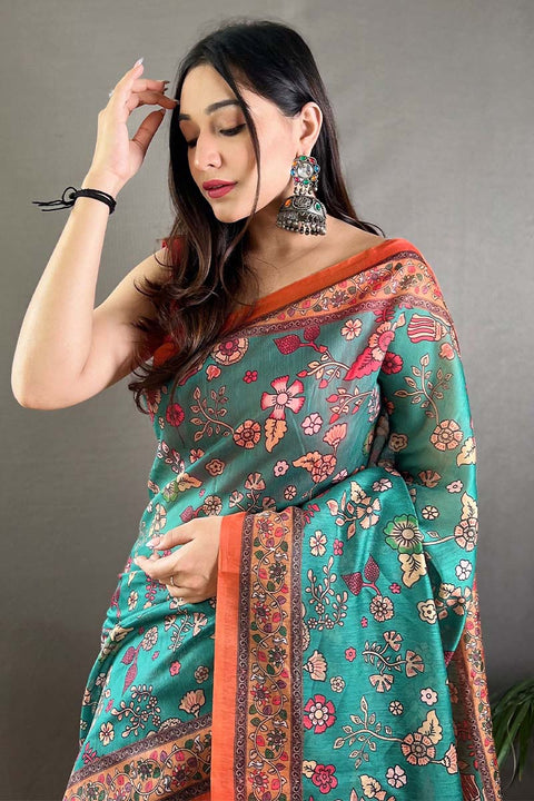 VastraLakshmi Gratifying Firozi Kalamkari Printed Saree With Girlish Blouse Piece