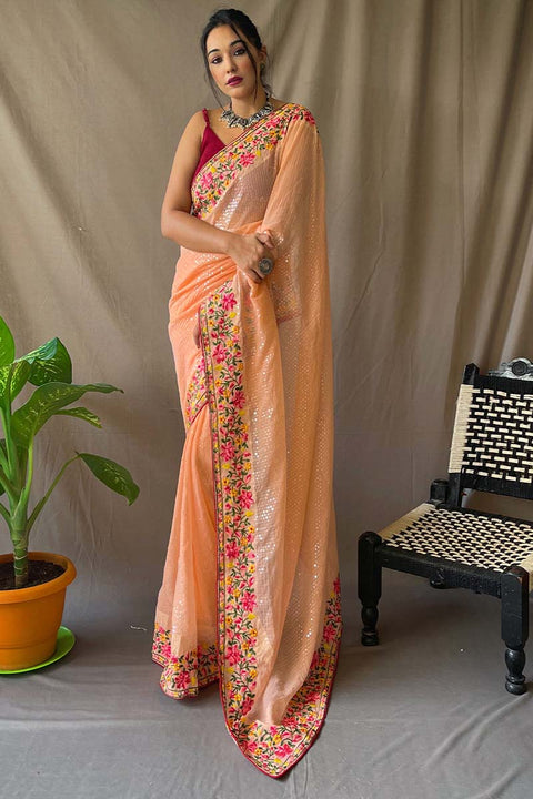 VastraLakshmi Quintessential Peach Sequence Work Georgette Saree With Forbearance Blouse Piece